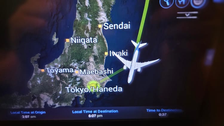 My flight monitor from the airplane, showing an imminent arrival at Haneda International Airport.